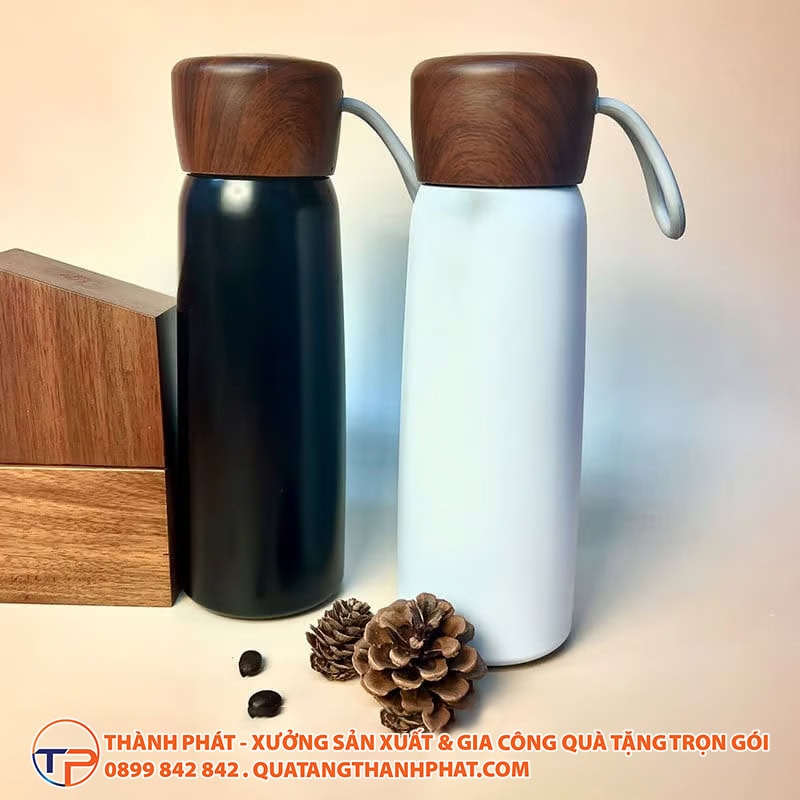 Binh giu nhiet hot wood nap go quai cao su tien ich 1